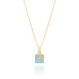 Tiny Jewels gold pendant with a blue square and yellow swastika symbol on a white background