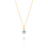 Tiny Jewels gold necklace with a blue evil eye pendant on a white background
