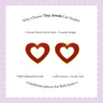 Tiny Jewels heart-shaped gold earrings on a white card with purple border and text about the product.