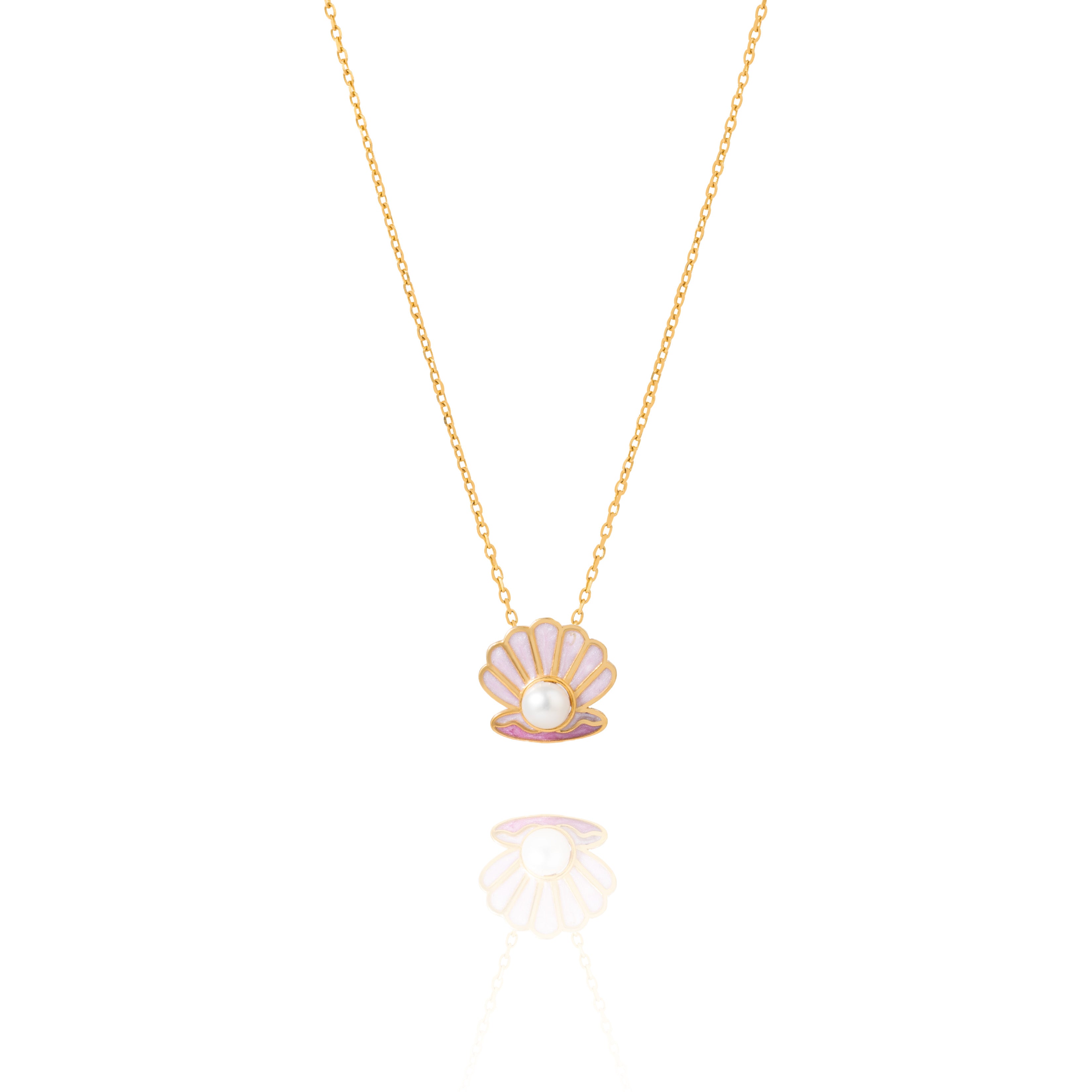 Tiny Jewels necklace with a shell pendant featuring a pearl on a white background
