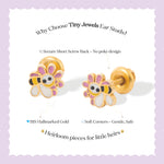 Tiny Jewels gold ear studs with cartoon character design on a light purple background