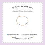 Tiny Jewels advertisement for Tiny Jewels Kadas jewelry on a light purple background
