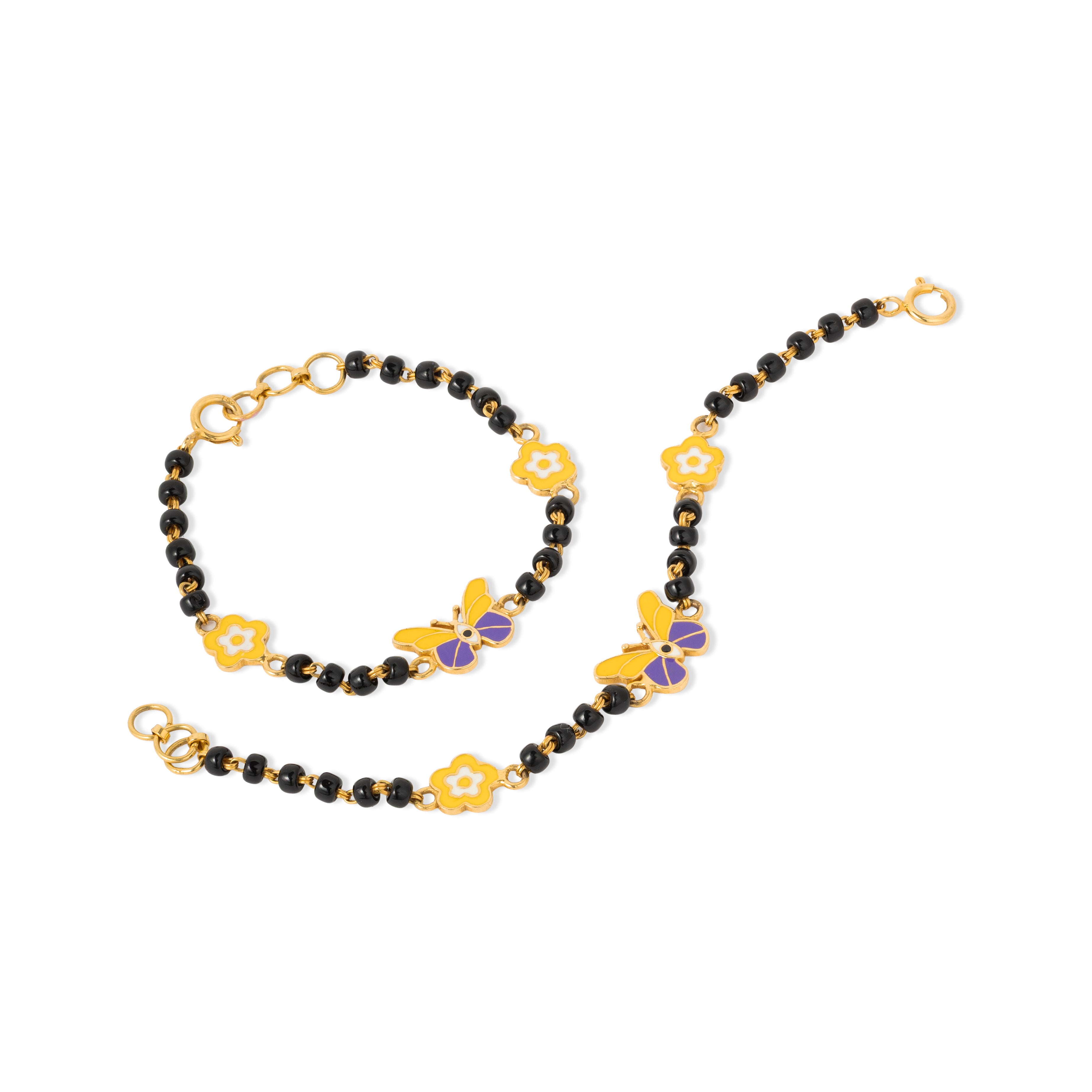 Tiny Jewels black beaded necklace with gold and purple floral accents on a white background