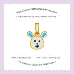 Tiny Jewels Gold pendant shaped like a rabbit with blue accents on a white background