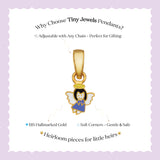Tiny Jewels gold angel pendant with text on a light purple background