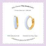 Tiny Jewels gold hoop earrings with light blue stones on a white background with text about product features.
