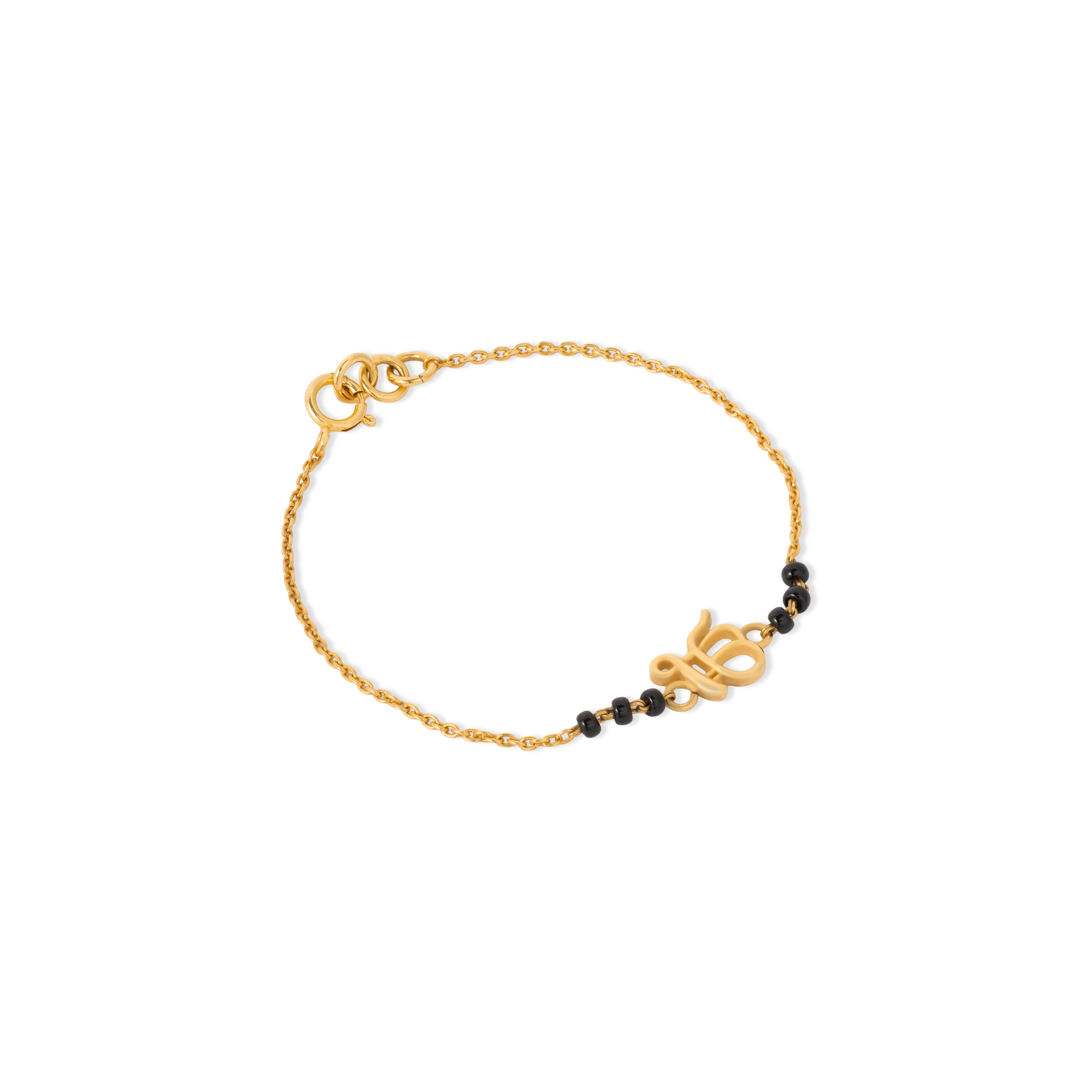 Tiny Jewels gold bracelet with black beads on a white background