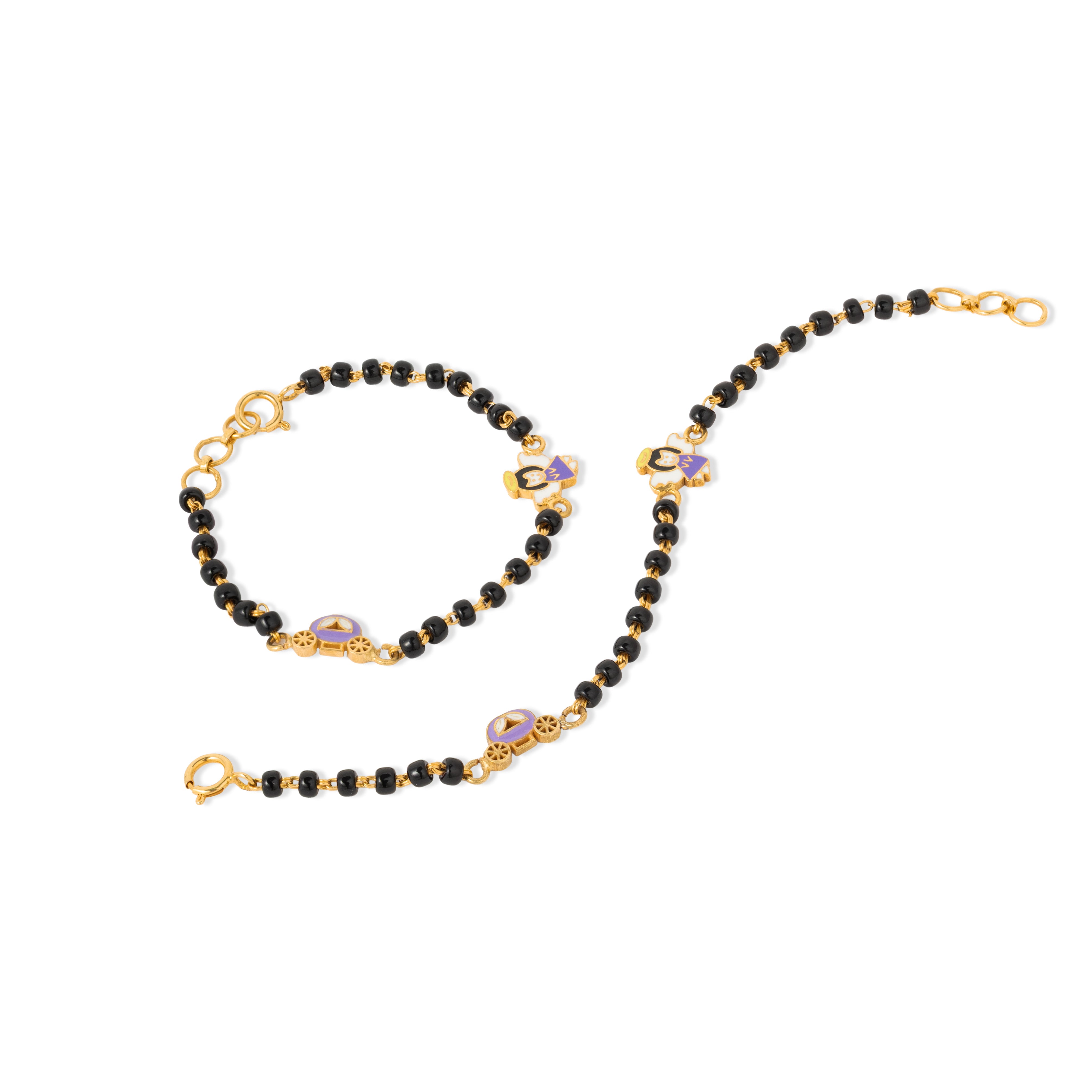 Tiny Jewels black beaded bracelet with gold accents on a white background