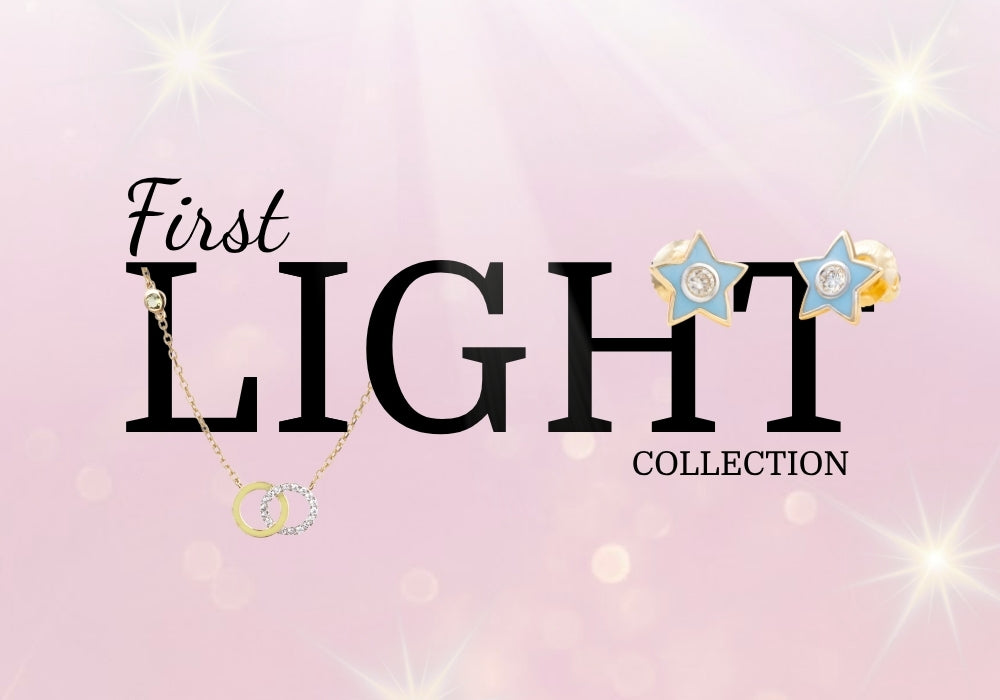 Tiny Jewels advertisement for 'First Light Collection' with jewelry on a pink background