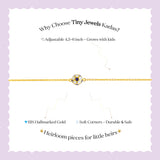 Tiny Jewels advertisement for Tiny Jewels Kadas jewelry on a light purple background