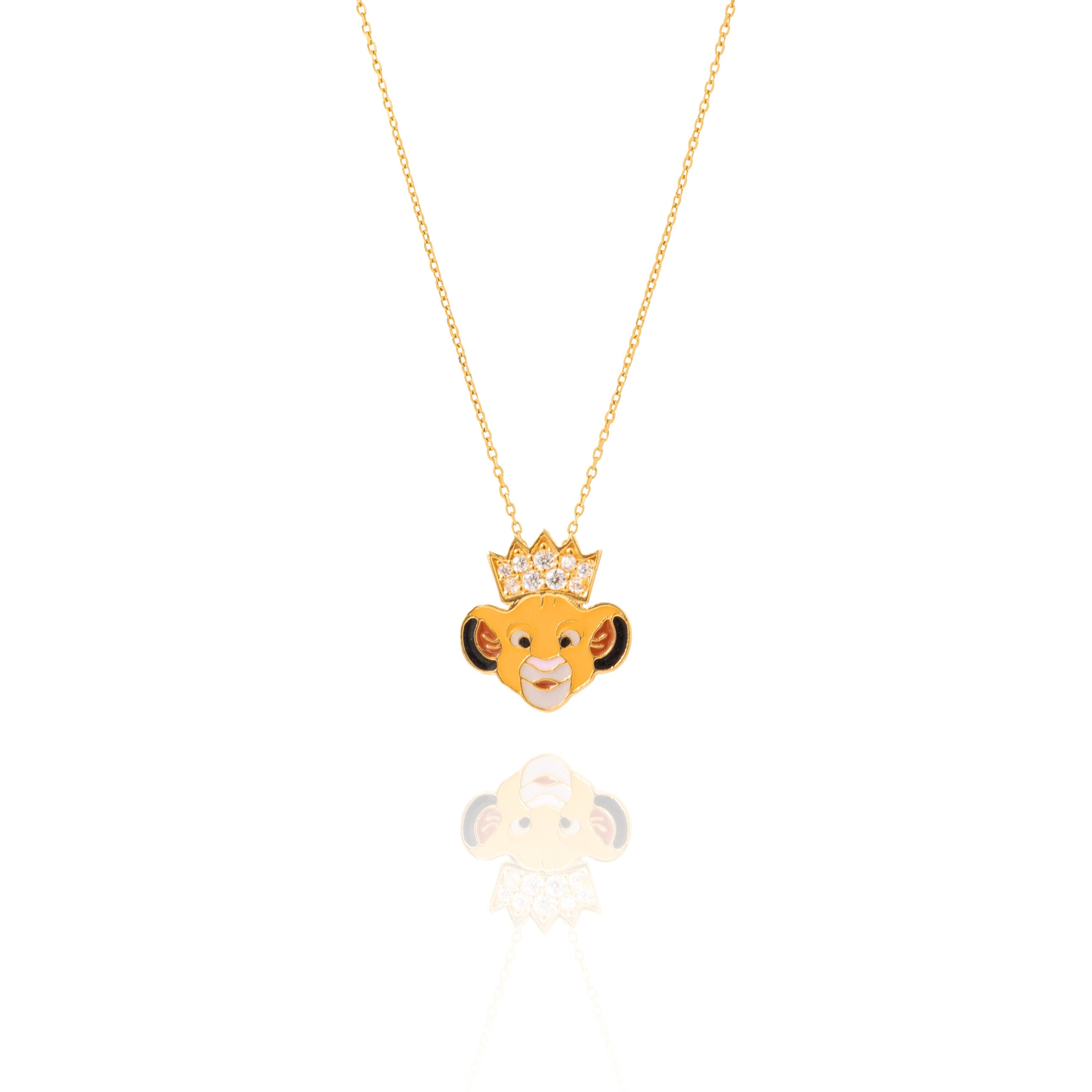 Gold necklace with a lion head pendant on a white background