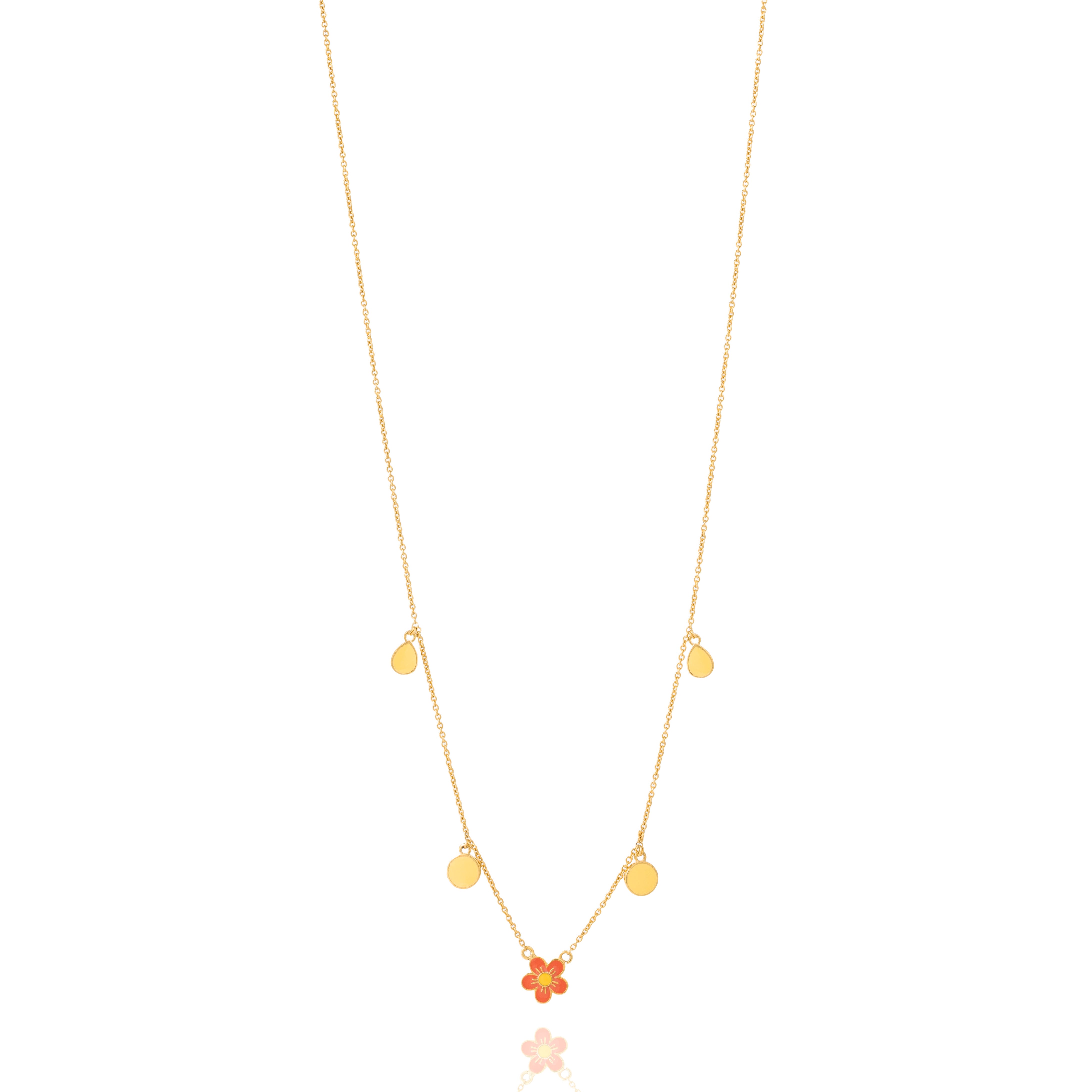 Tiny Jewels gold necklace with yellow beads on a white background