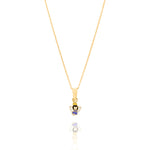 Tiny Jewels gold angel pendant with a blue dress on a white background