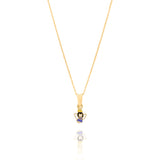 Tiny Jewels gold angel pendant with a blue dress on a white background
