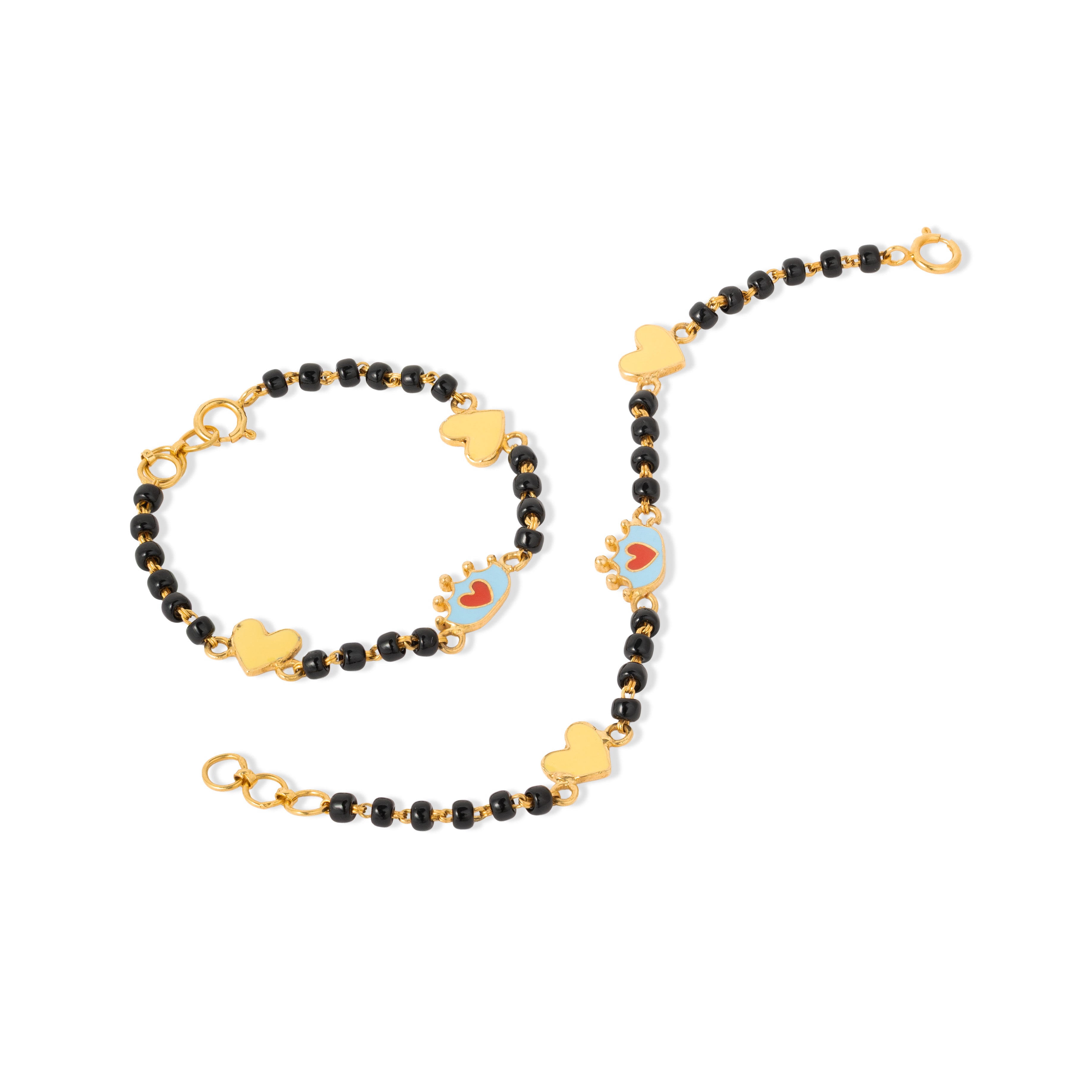 Tiny Jewels bracelet with black beads and gold heart-shaped charms on a white background