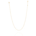 Tiny Jewels gold chain necklace on a white background