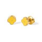 Tiny Jewels pair of yellow flower-shaped earrings on a white background