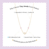 Tiny Jewels necklace with text on a light purple background