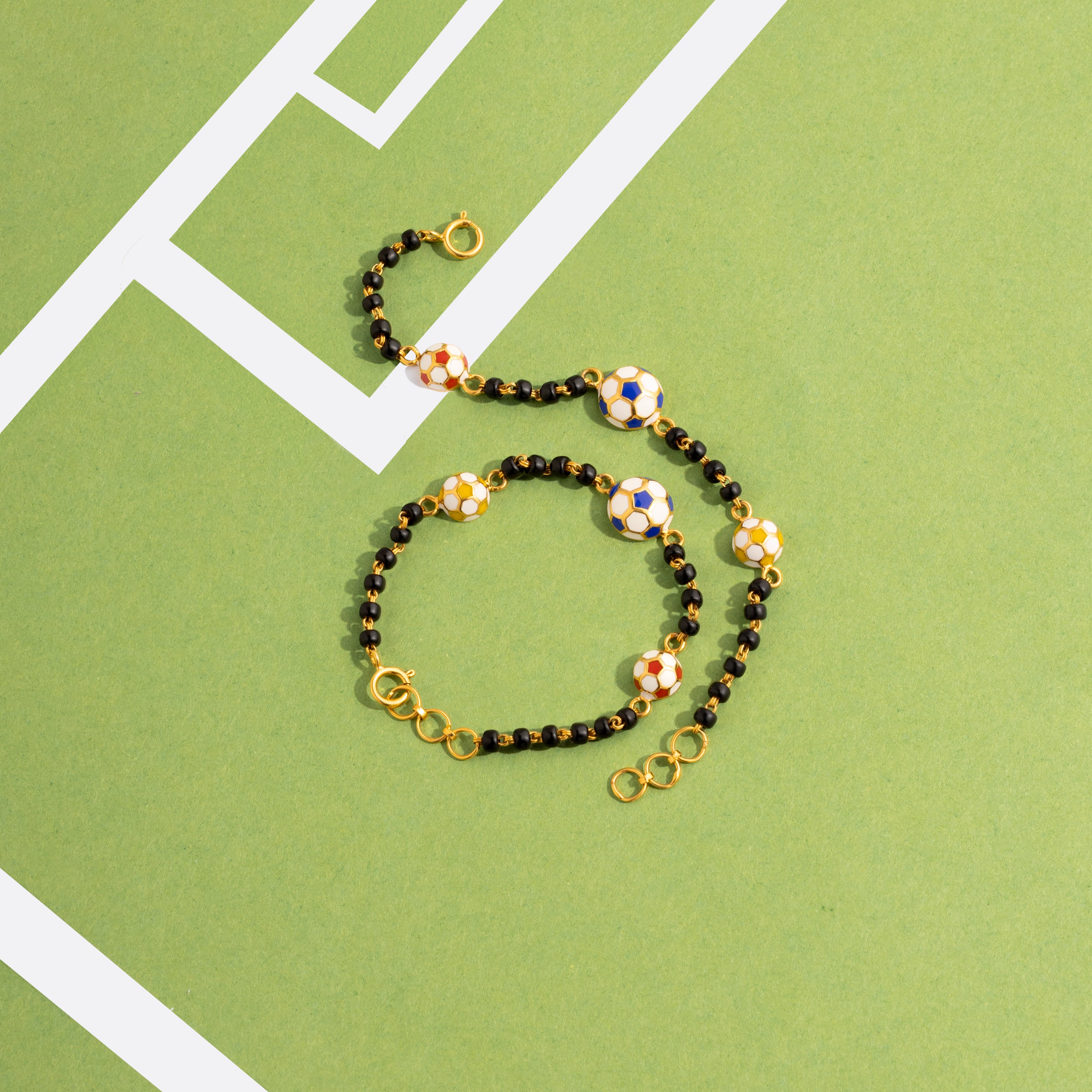 Tiny Jewels bracelet with floral beads on a green background