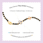 Tiny Jewels necklace with black, gold, and blue beads on a white background with promotional text about Tiny Jewels Nazariyas.