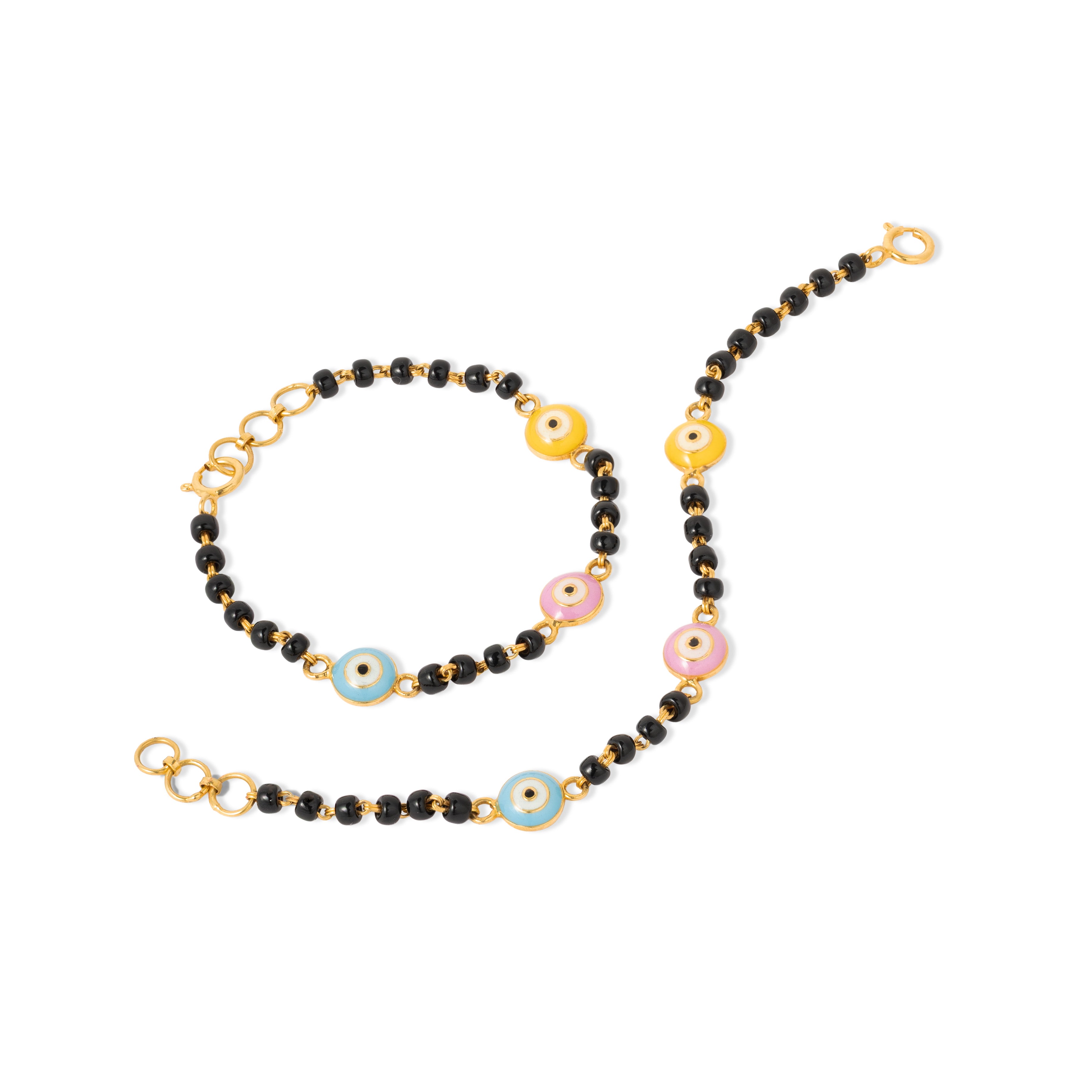 Tiny Jewels necklace with black beads, gold chain, and colorful evil eye charms on a white background