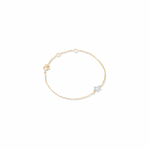 Tiny Jewels gold bracelet with a star-shaped charm on a white background