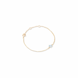 Tiny Jewels gold bracelet with a star-shaped charm on a white background