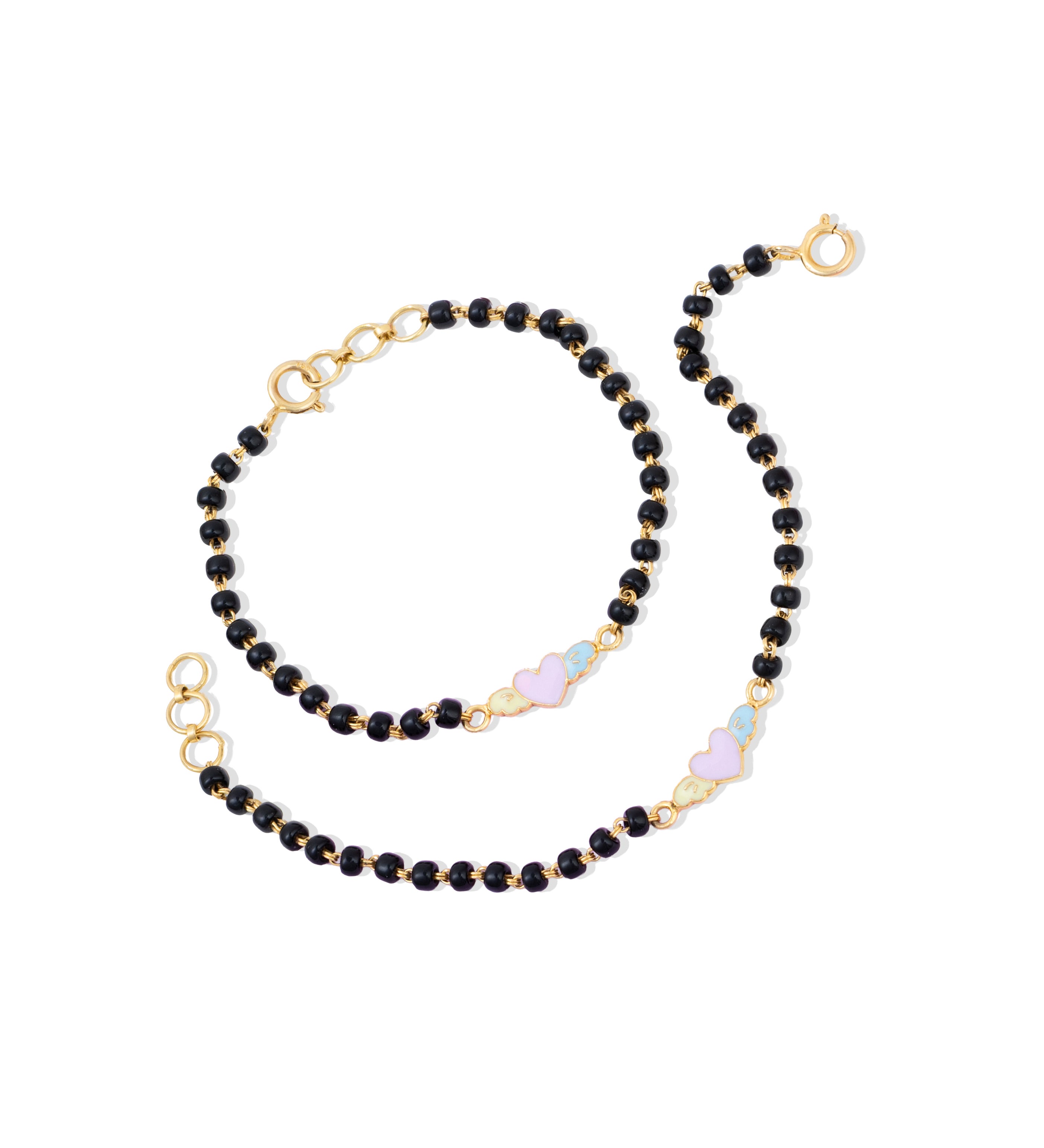Tiny Jewels black beaded necklace with gold accents on a white background